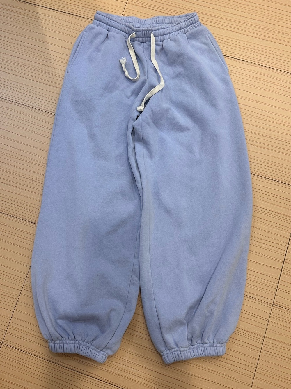 Women’s Light Blue Jogger Sweatpants with Drawstring with Writing on Bum. XS